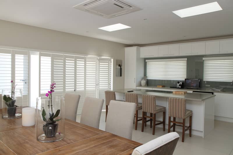 Dining room track shutters