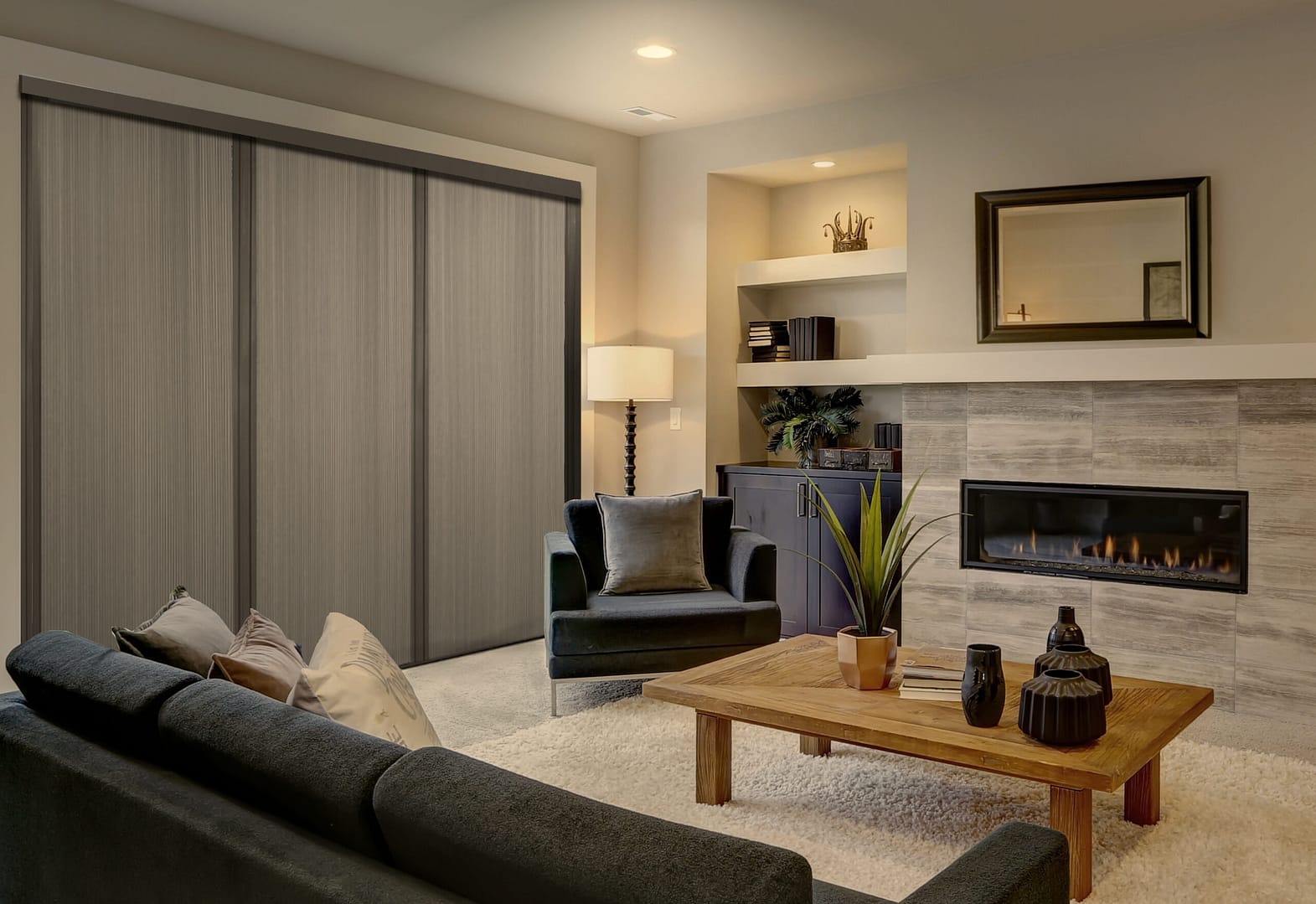 Beautiful modern living room interior with stone wall and firepl