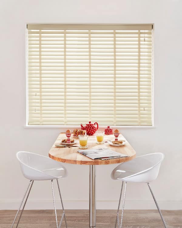 white venetian blind breakfast room