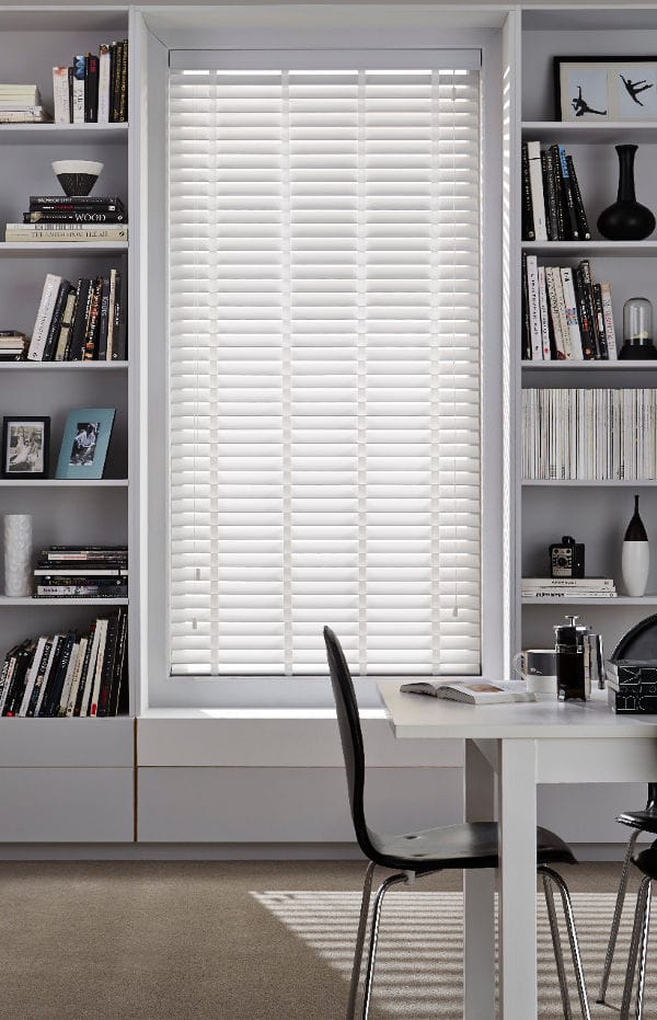 white venetian blinds office